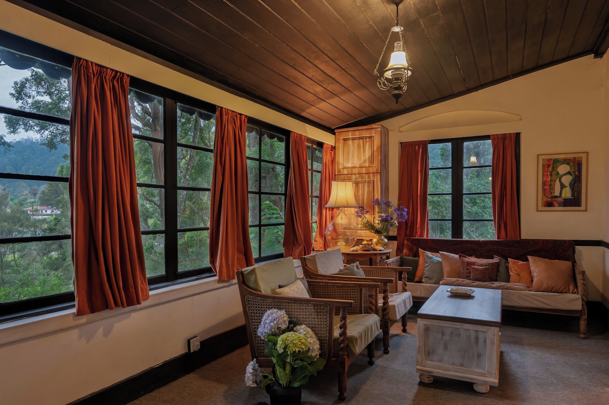 A sunlit seating area looking into the garden